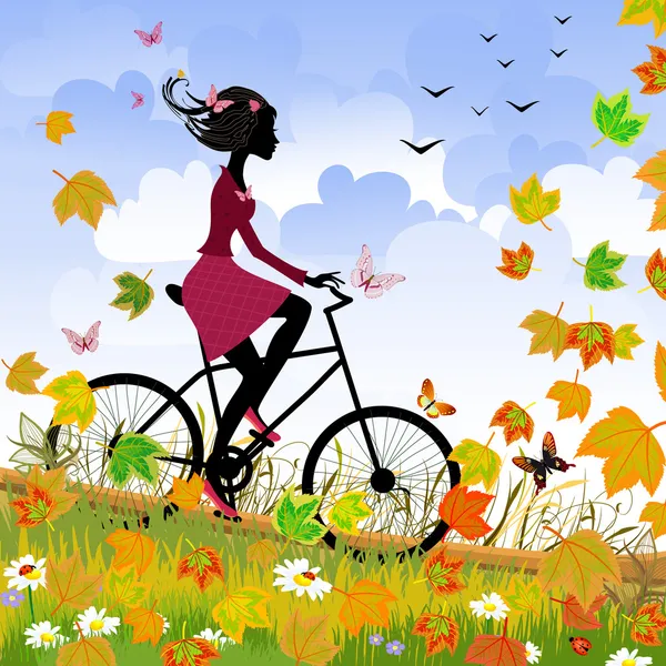 Girl on bike outdoors in autumn