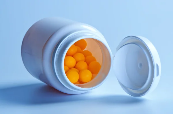Pilules dans un bocal . — Photo