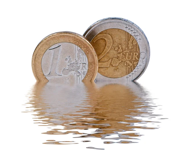 Coins one and two euro reflection in the water. — Stock Photo, Image