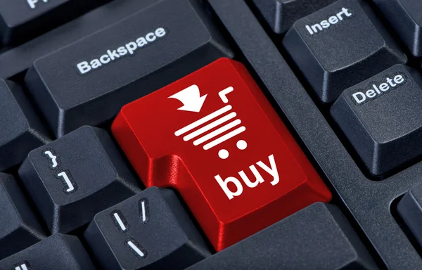 Computer pulsante rosso acquistare con carrello, concetto di commercio internet . — Foto Stock