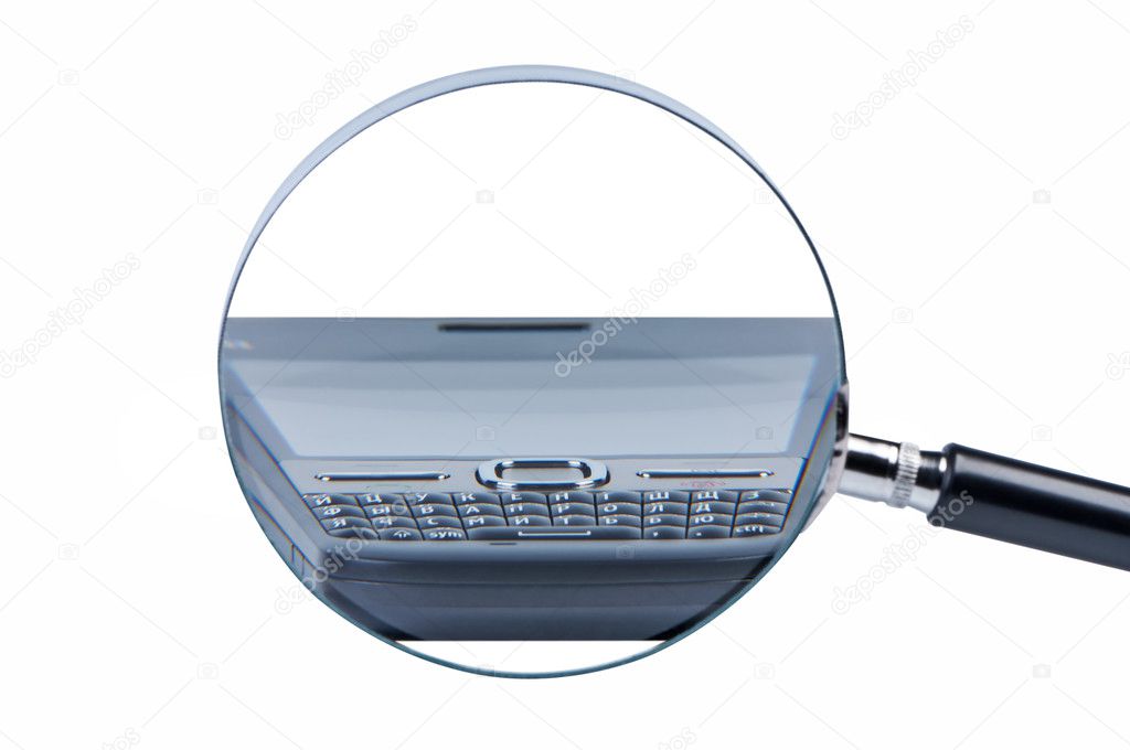 Magnifier and mobile phones on white background isolate.