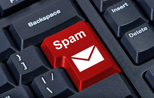 Röda knappen spam med ikonen kuvert, internet koncept. — Stockfoto