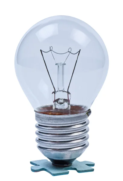 Lamp on puzzle. — Stock Photo, Image