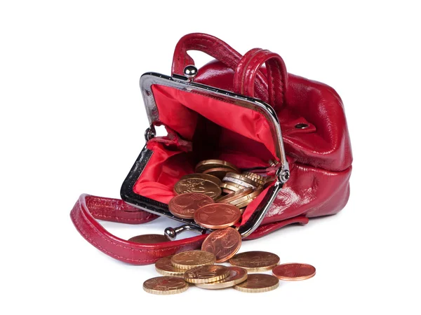 Münzen in der Handtasche der Frau auf weißem Hintergrund. — Stockfoto