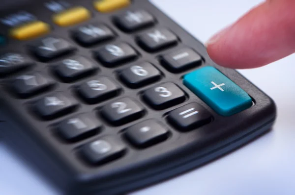 Kalkulačka s tlačítko plus detail. — Stock fotografie