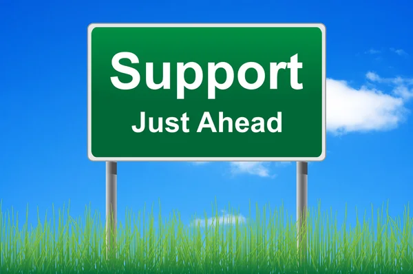 Support road sign on sky background. Bottom grass. — Stockfoto