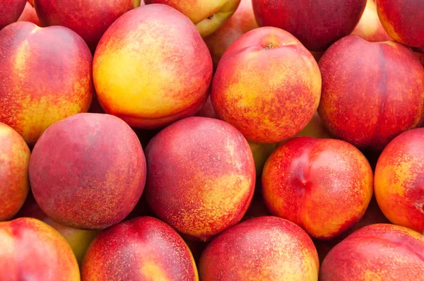 Ripe, bright peach close up. — Stock Photo, Image