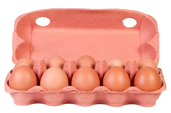 Huevos de pollo en caja de cartón aislados en blanco . — Foto de Stock