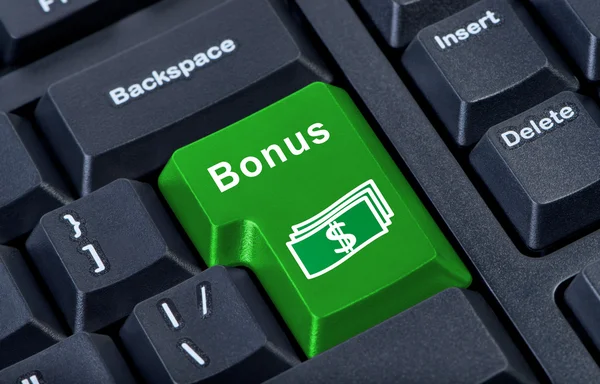 Button keypad bonus with money symbol. — Stock Photo, Image