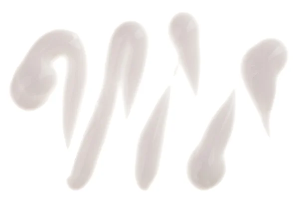 Образец увлажняющего крема для лица, изолированный на белом — стоковое фото