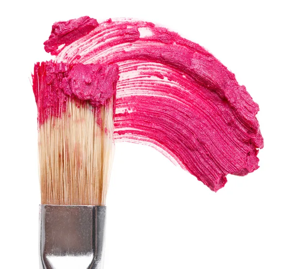 Curso de batom rosa (amostra) com pincel de maquiagem, isolado no whi — Fotografia de Stock