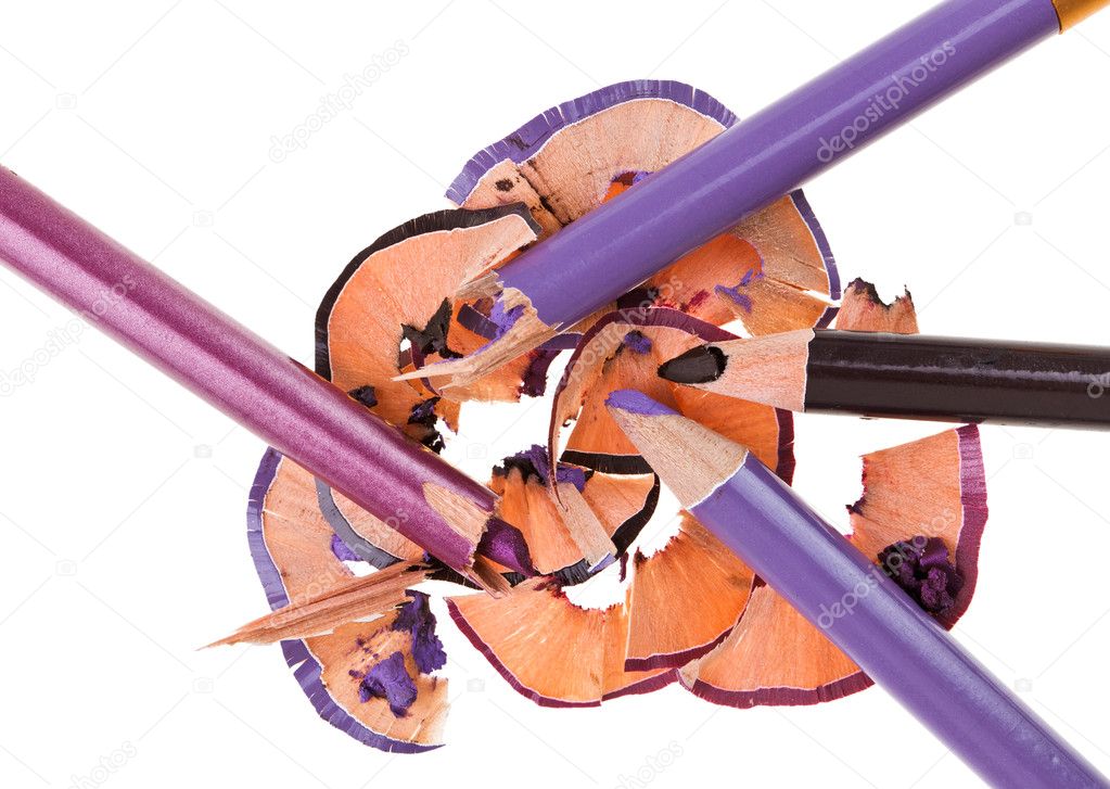 Broken eye shadow pencils splinters (scobs), isolated on white m