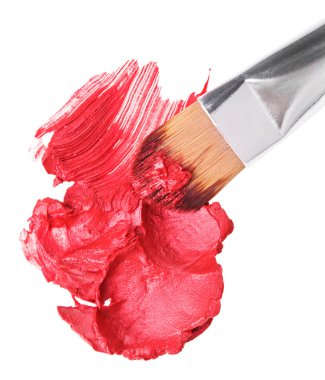 Red lipstick stroke (sample) with makeup brush, isolated on whit clipart