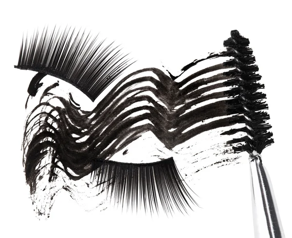 Μαύρη μάσκαρα εγκεφαλικό επεισόδιο, βούρτσα και ψεύτικες βλεφαρίδες αφηρημένη composi — Φωτογραφία Αρχείου