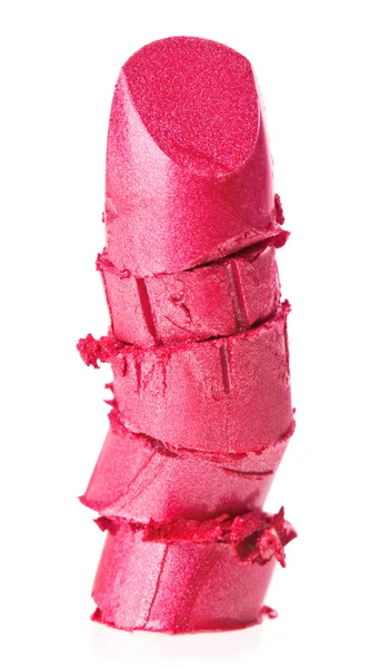 Измельченный образец розовой помады, выделенный на белом — стоковое фото
