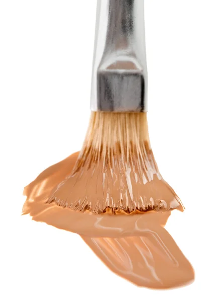 Beige liquid foundation makeup stroke with brush, isolated on wh — Stock Photo, Image