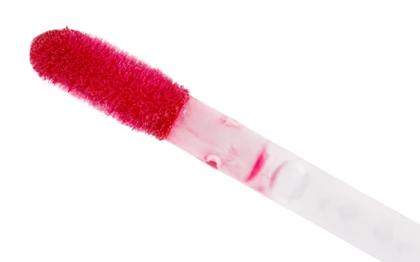 Escova de brilho de lábios de fluido vermelho, isolada em branco — Fotografia de Stock
