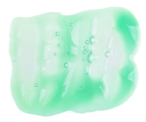 Ukázka zelený krém (krém), izolované na bílém — Stock fotografie
