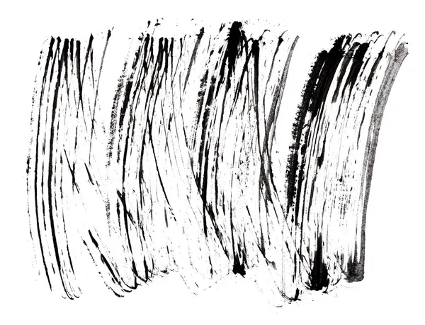 Инсульт (образец) черной туши, выделенный на белом макросе — стоковое фото