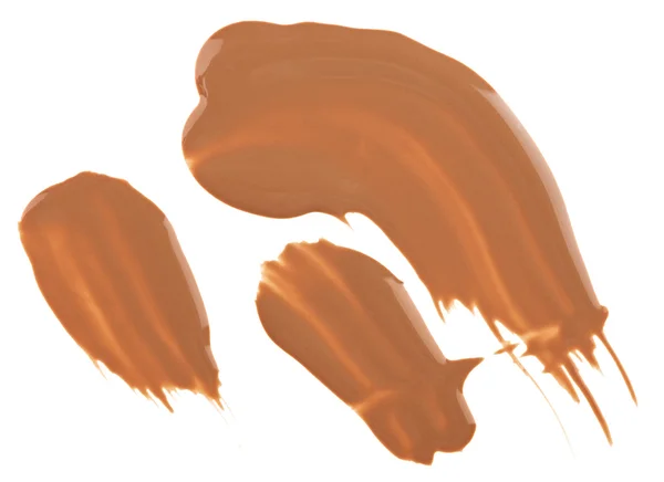 Muestras de maquillaje de crema de tono beige (base), aisladas en blanco —  Fotos de Stock