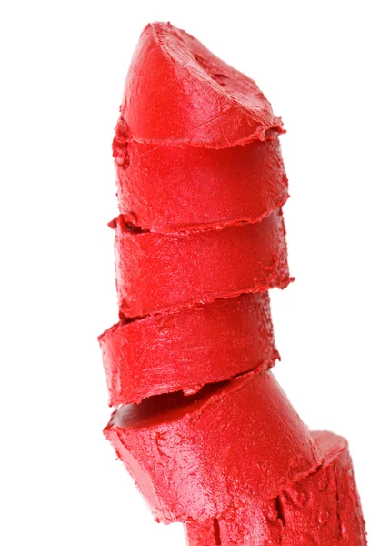 Измельченный образец красной помады, выделенный на белом — стоковое фото