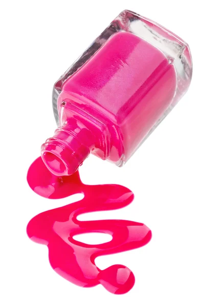 Lahev růžový lak na nehty s glazurou pokles vzorky, izolované na — Stock fotografie