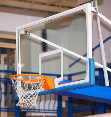 Basketball basket in sports hall clipart