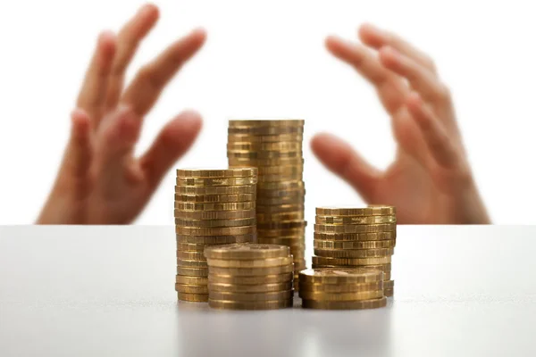 Greed hands catching money — Stock Photo, Image