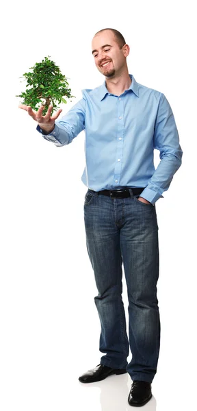 Man on white with plant — Stock Photo, Image