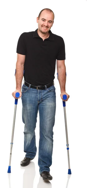 Homem com muleta — Fotografia de Stock