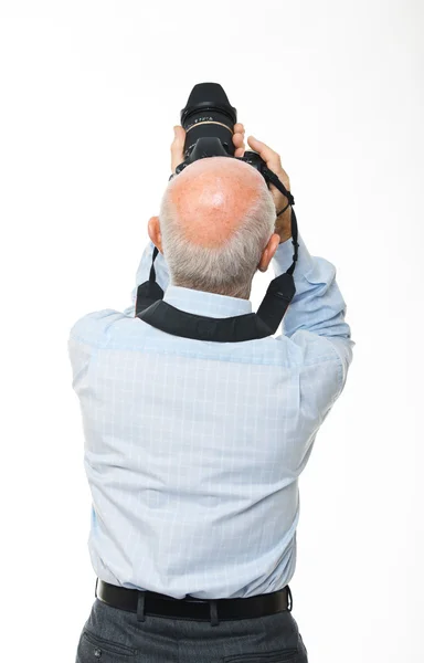 Man with camera back view — Stock Photo, Image