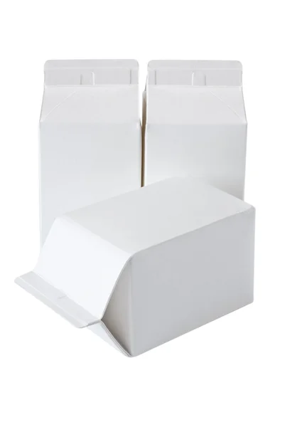 Tres cajas de leche por medio litro en blanco —  Fotos de Stock