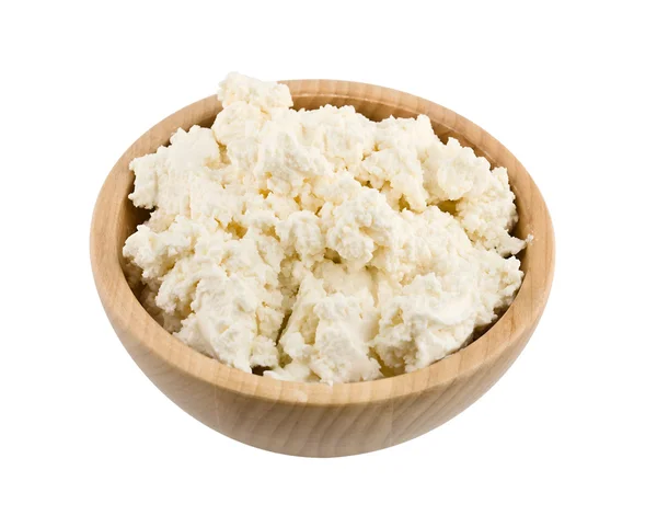 Fresh cottage cheese in wooden bowl — Stock Photo, Image