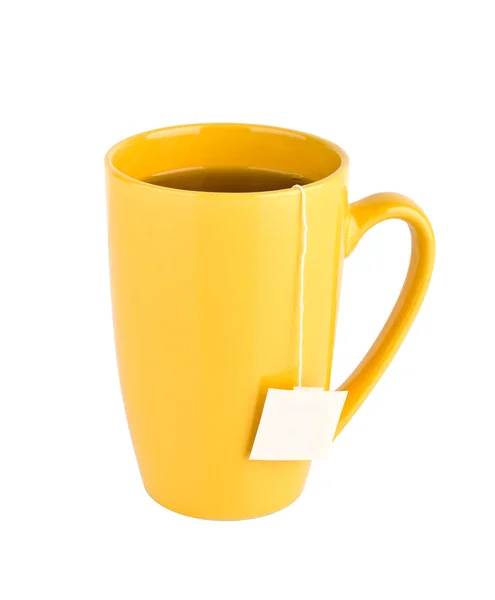 Żółty kubek herbaty na białym tle — Zdjęcie stockowe
