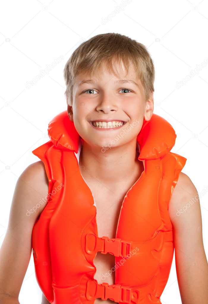 Teen in an orange life jacket for water sports - on a white back
