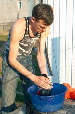 Man hands washes clothes clipart