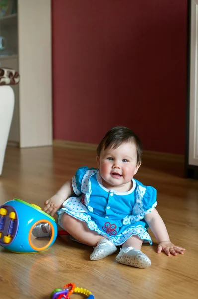 Girl with toy at home — Stock Photo, Image