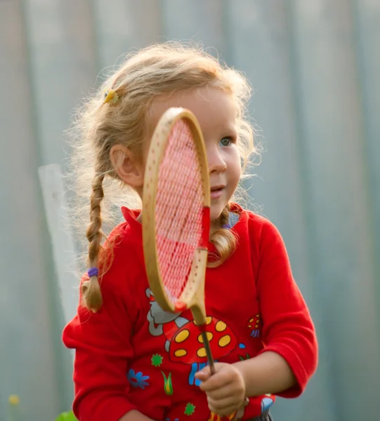 Girl plays in badminton — Stock Photo, Image