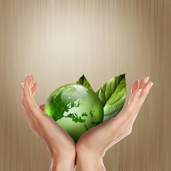Green earth with growing plant — Stock Photo, Image