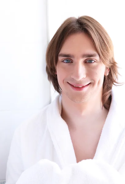 Portrait of a young man in bath robe — Stock Photo, Image