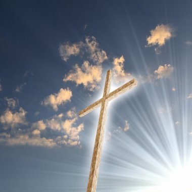 Christian cross against the sky clipart