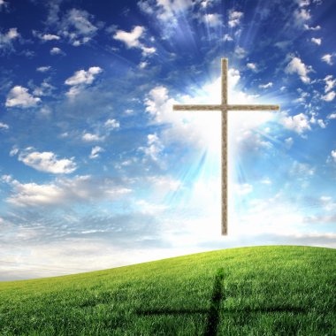 Christian cross against the sky clipart