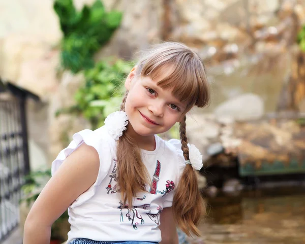 Portrait of little girl outdoors — Stock Photo, Image