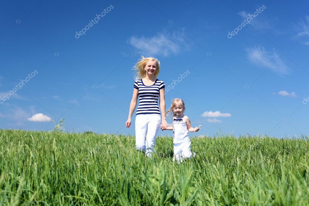 Mother with her daughter outdoors — Stock Photo © SergeyNivens #5856936