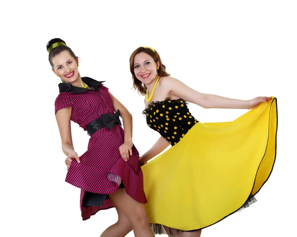 Due giovani donne in abiti di colore brillante — Foto Stock