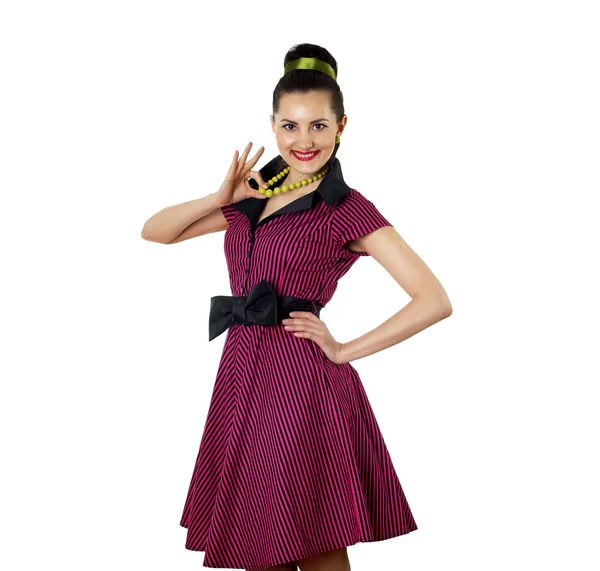 Молода жінка в яскравій кольоровій сукні — стокове фото