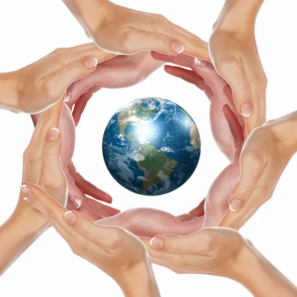 Lidská ruka a symbolem naší planety — Stock fotografie