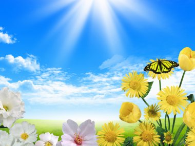 Beautiful flowers against the blue sky clipart