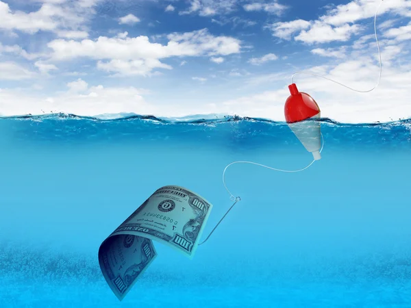 Рыбный крючок под водой с банкнотами — стоковое фото