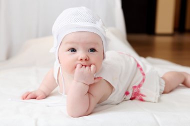 Cute baby in hat clipart